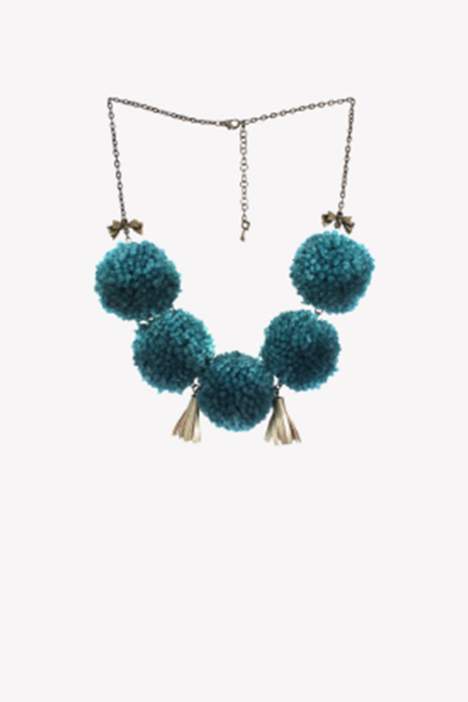 Short statement necklace with turquoise pompoms, sequins, leather tassels and gold bow charms